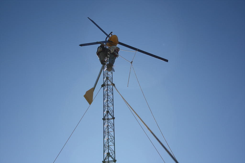 Putting an alternator and blades on a Bergey Excel using the gin pole - windy work